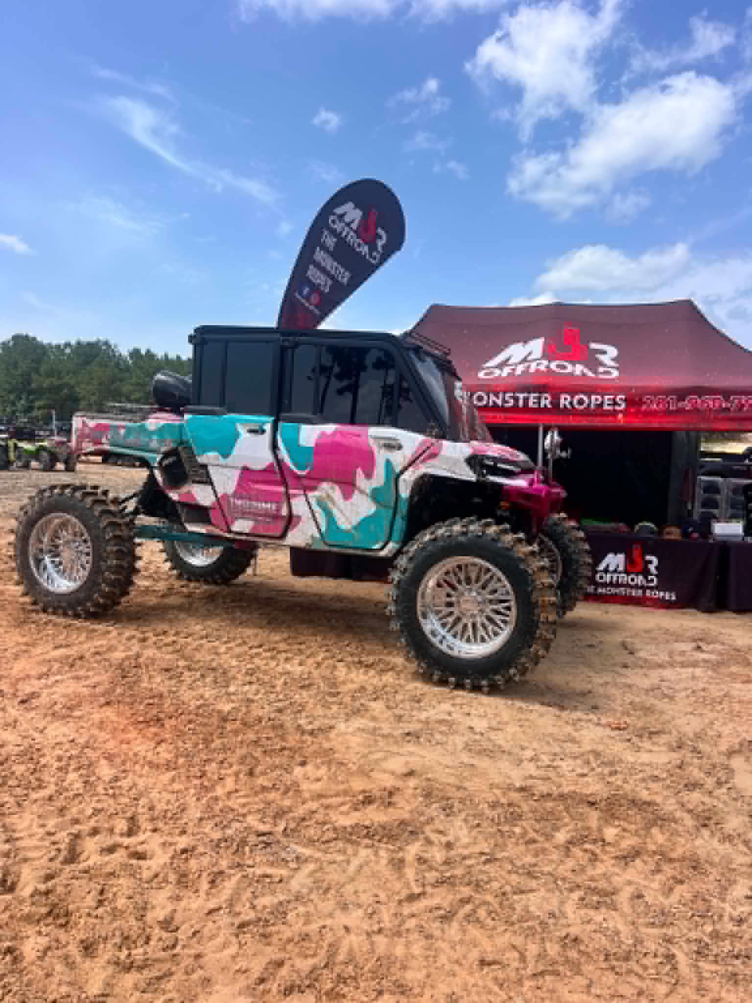 Custom camo-wrapped build at an off-road meetup